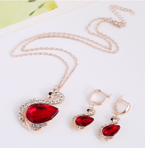 Ensemble de bijoux collier et boucles d'oreilles en cristal coréen, bijoux élégants et raffinés avec pierres brillantes.