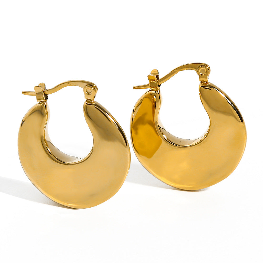 Boucles d'oreilles creuses en acier titanium plaqué or en forme de croissant, élégantes et modernes.