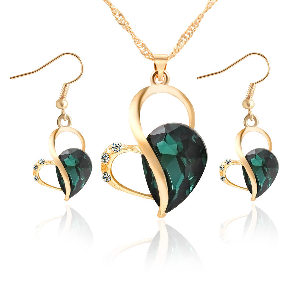 Ensemble de bijoux en perles en forme de cœur avec boucles d'oreilles en goutte d'eau, élégant et sophistiqué.