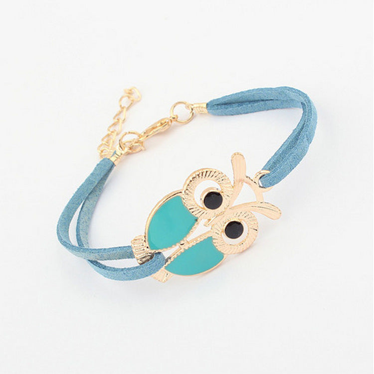 Bracelet en cuir coloré avec un motif de chouette, par MARKET DE PRODUITS DE BEAUTÉ & SANTÉ, visible sur l'image.