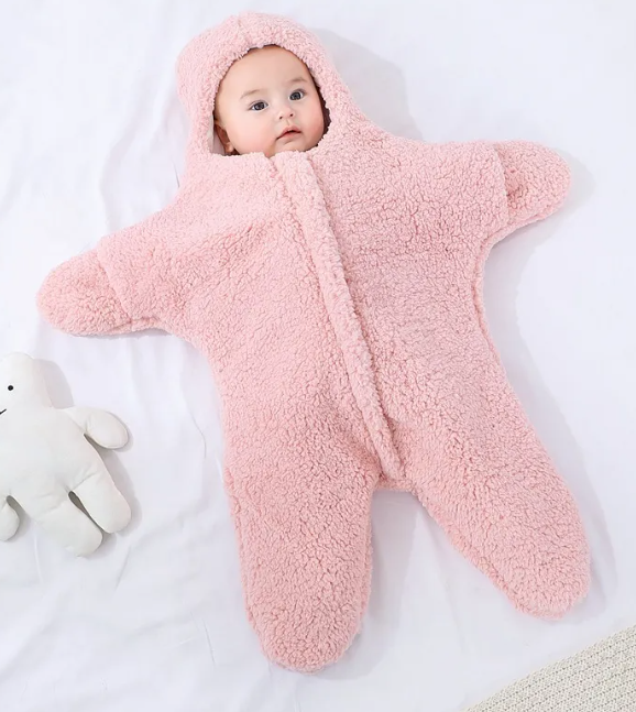 Couverture bébé Boutique Angenor en coton douce avec motifs colorés, idéale pour envelopper bébé confortablement.