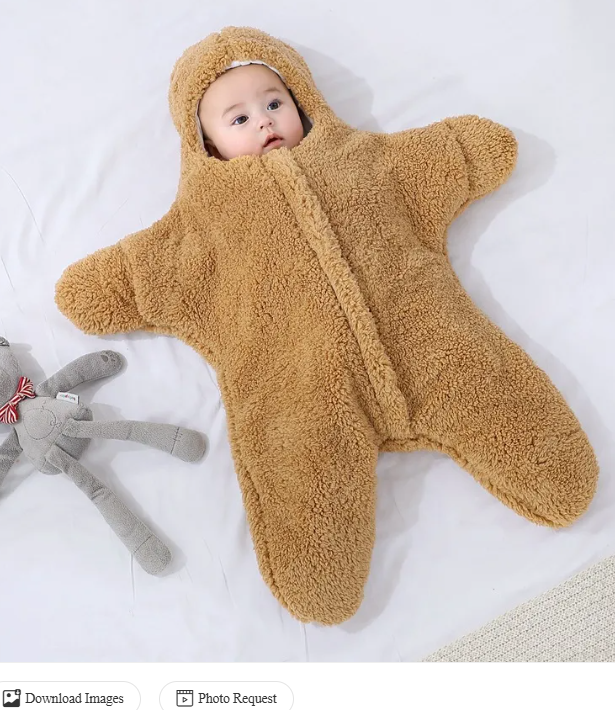 Couverture pour bébé Boutique Angenor en tissu doux avec motifs colorés, idéale pour réchauffer et envelopper bébé.