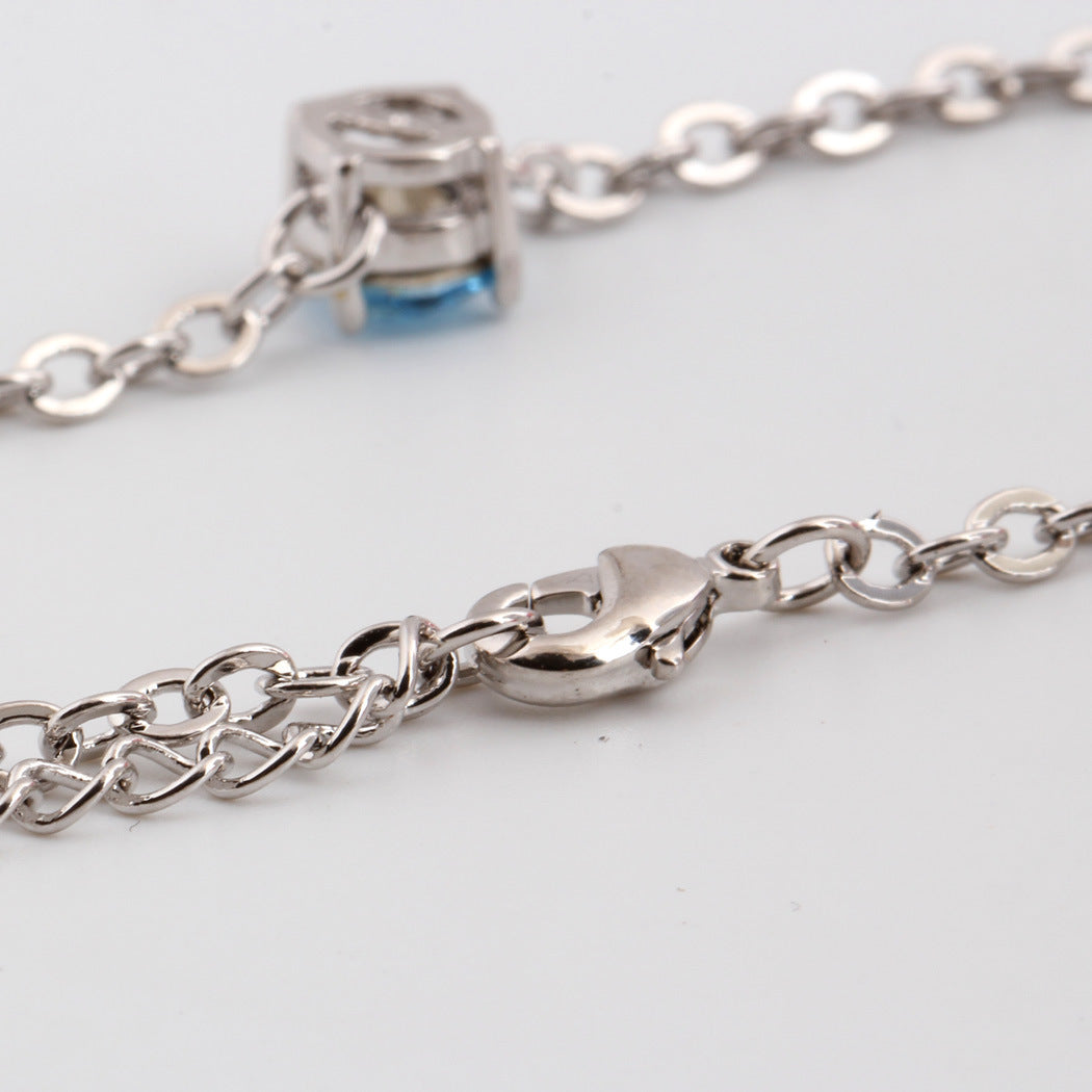 Bracelet en cristal autrichien plaqué platinum pour femmes, bijou élégant avec cristaux brillants et finition raffinée.
