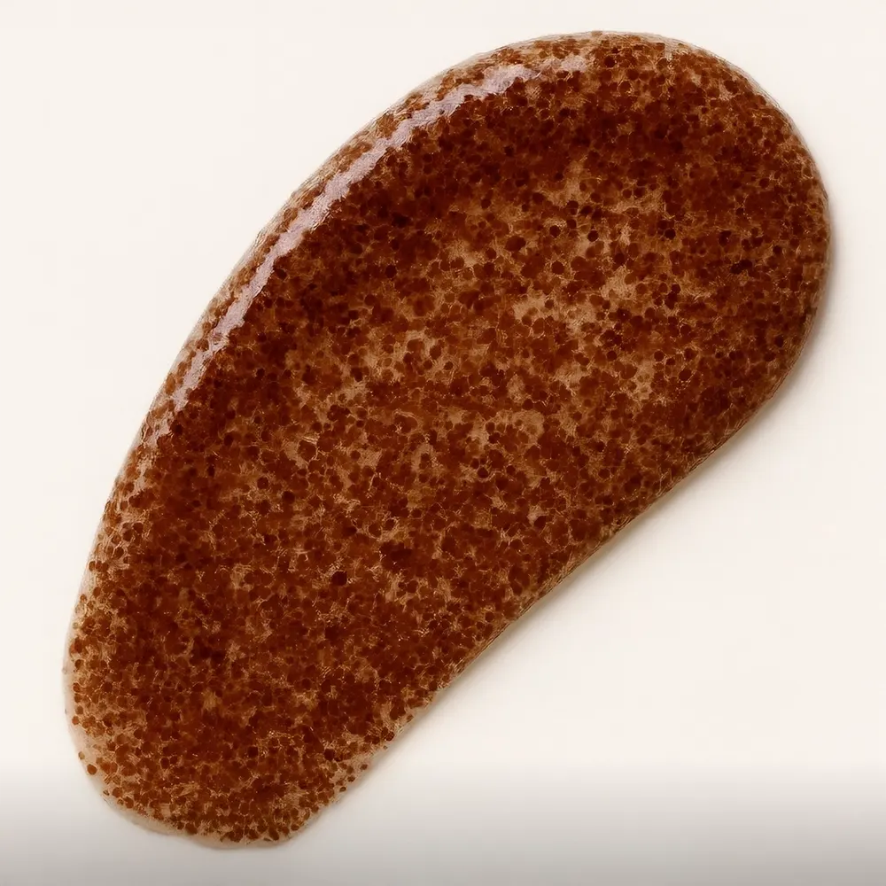 Gommage visage au miel et calendula de Born to Bio, texture douce avec grains exfoliants, certifié bio.