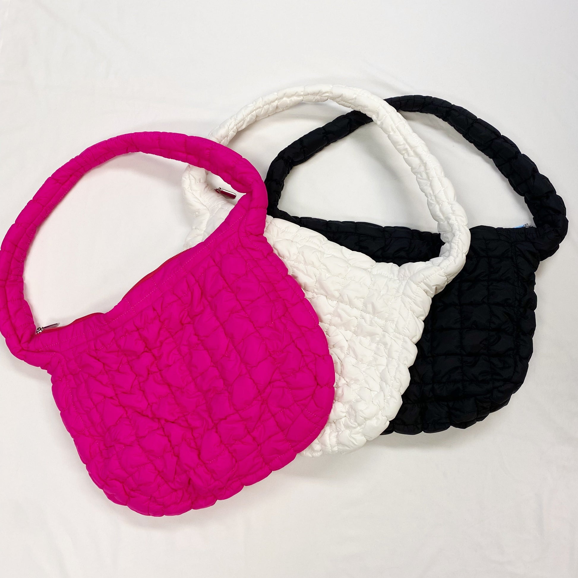 Sac à bandoulière matelassé Carry All de Boutique Angenor, style pratique avec design élégant et compartiments spacieux.