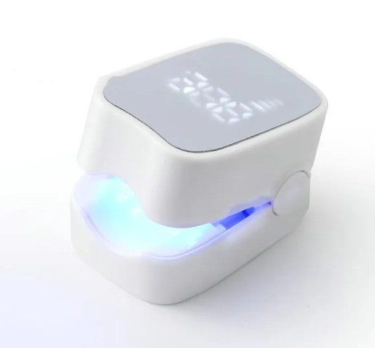Dispositif laser LED pour ongles antifongiques de la marque Boutique Angenor, montrant le dispositif portable et ses réglages.