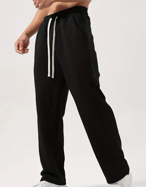 Pantalon de survêtement Track Sweatpants de Boutique Angenor, tissu confortable et style décontracté, visible dans l'image.