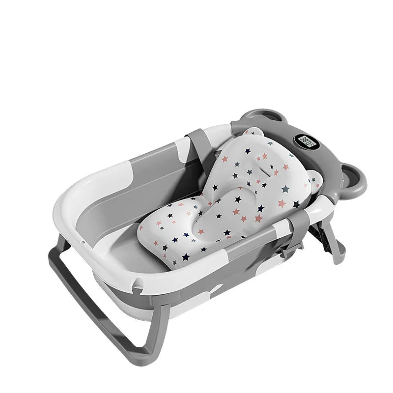 Baignoire pour bébé nouvelle-né Boutique Angenor avec capteur de température, en plastique blanc, adaptée aux bébés.