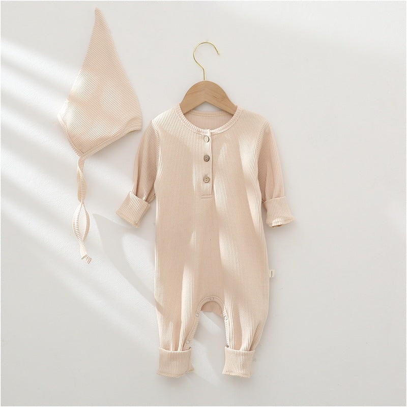 Body bébé en coton uni de Boutique Angenor, vêtement confortable et doux pour nouveau-né, couleur solide, vue de face.