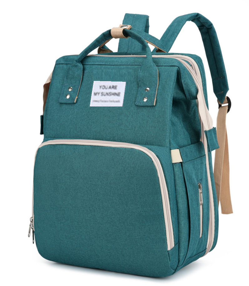 Grand sac à langer de grande capacité de la marque Boutique Angenor, avec plusieurs poches et compartiments pour maman.