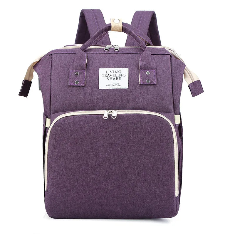 Grand sac à langer à grande capacité de la marque Boutique Angenor, idéal pour transporter tout le nécessaire de bébé.