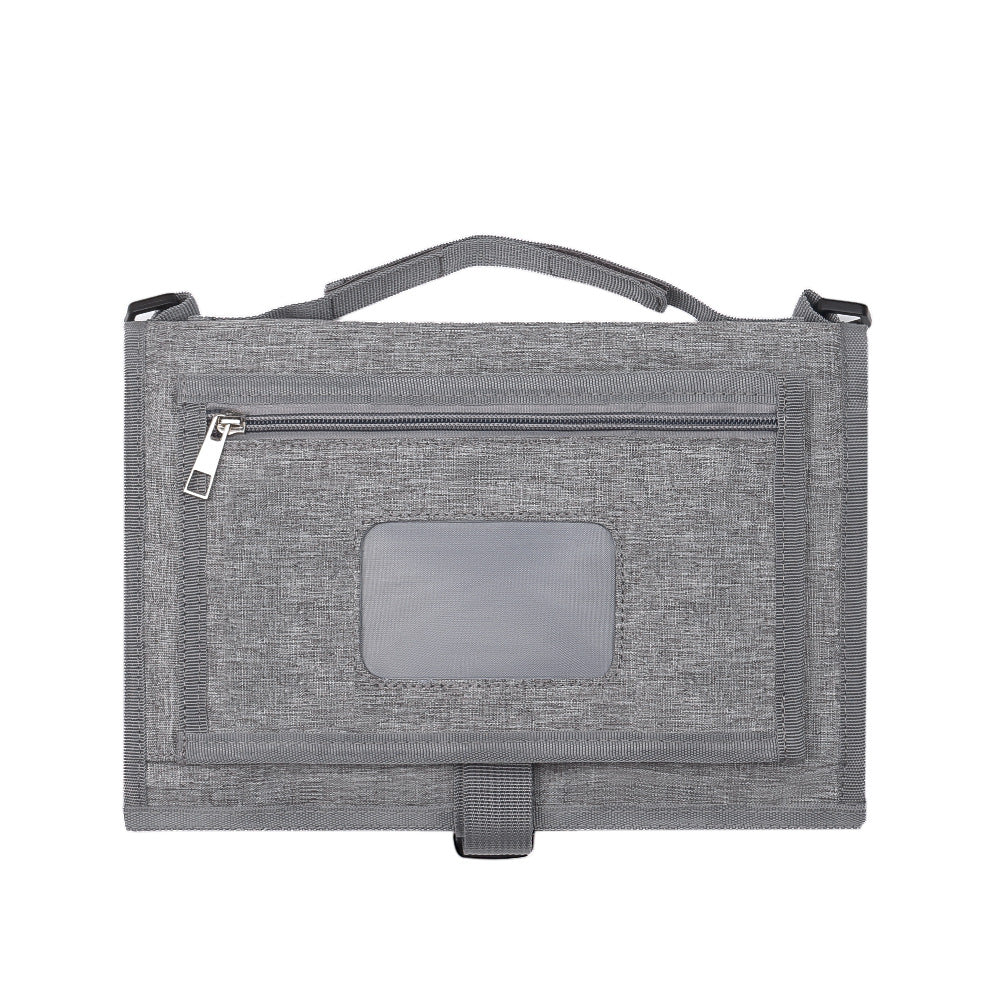 Tapis à langer portable pour bébé de la marque Boutique Angenor, surface douce avec compartiments pour accessoires.