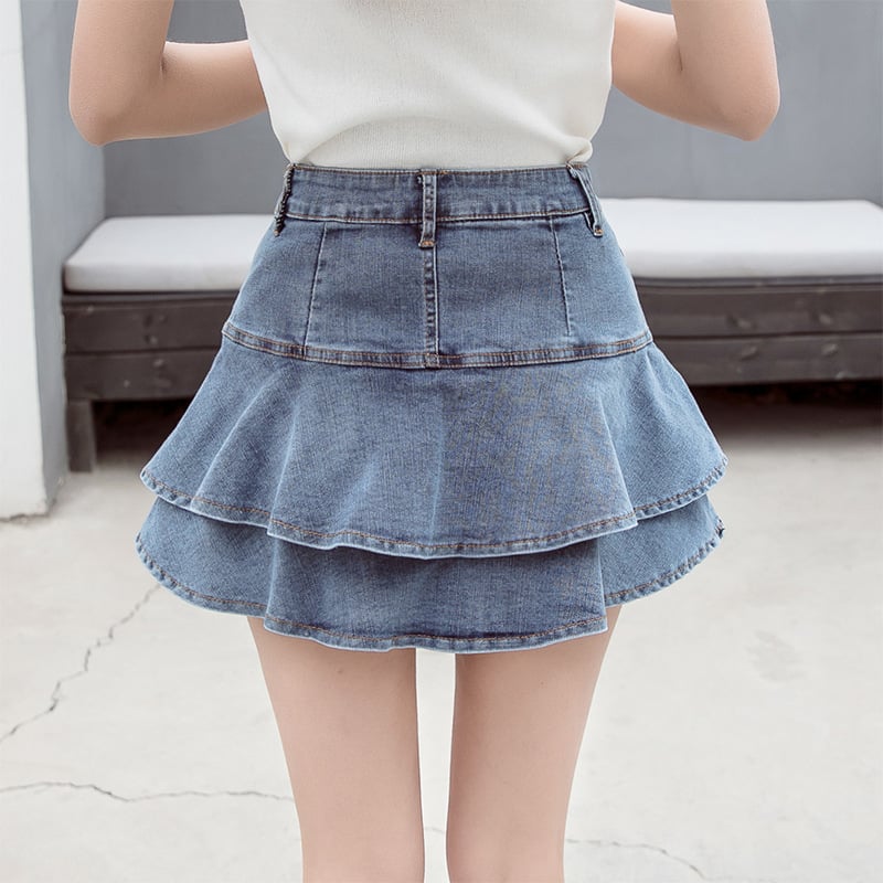 Jupe en denim à taille haute et volants style coréen, créée par Boutique Angenor, avec détails de volants et coupe tendance.