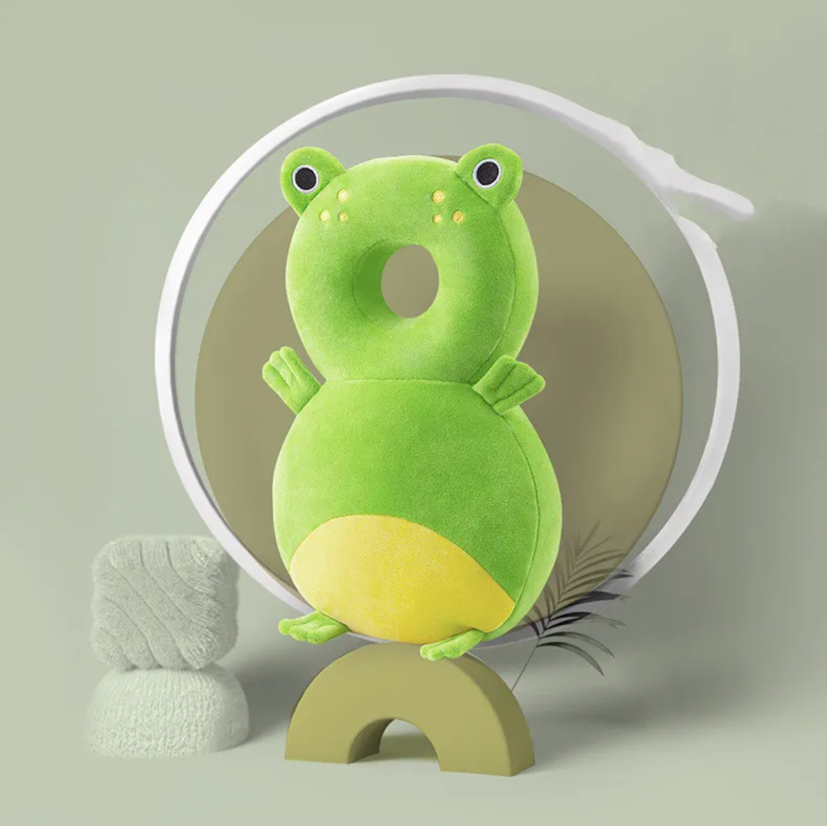 Pad de protection pour tête de tout-petit de la marque Boutique Angenor, doux et confortable pour la sécurité de l'enfant.