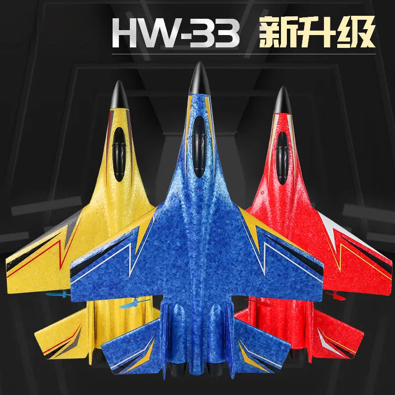 Avion en mousse à ailes fixes HW33 de Boutique Angenor, jouet télécommandé pour enfants, avec détails colorés et ailes blanches.