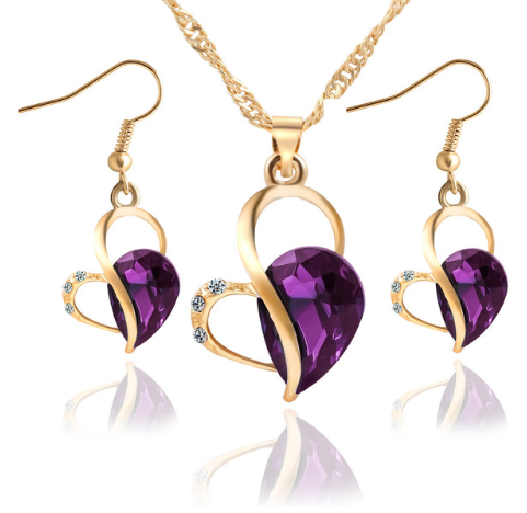 Ensemble de bijoux en perles en forme de cœur avec boucles d'oreilles en forme de goutte d'eau, élégant et féminin.