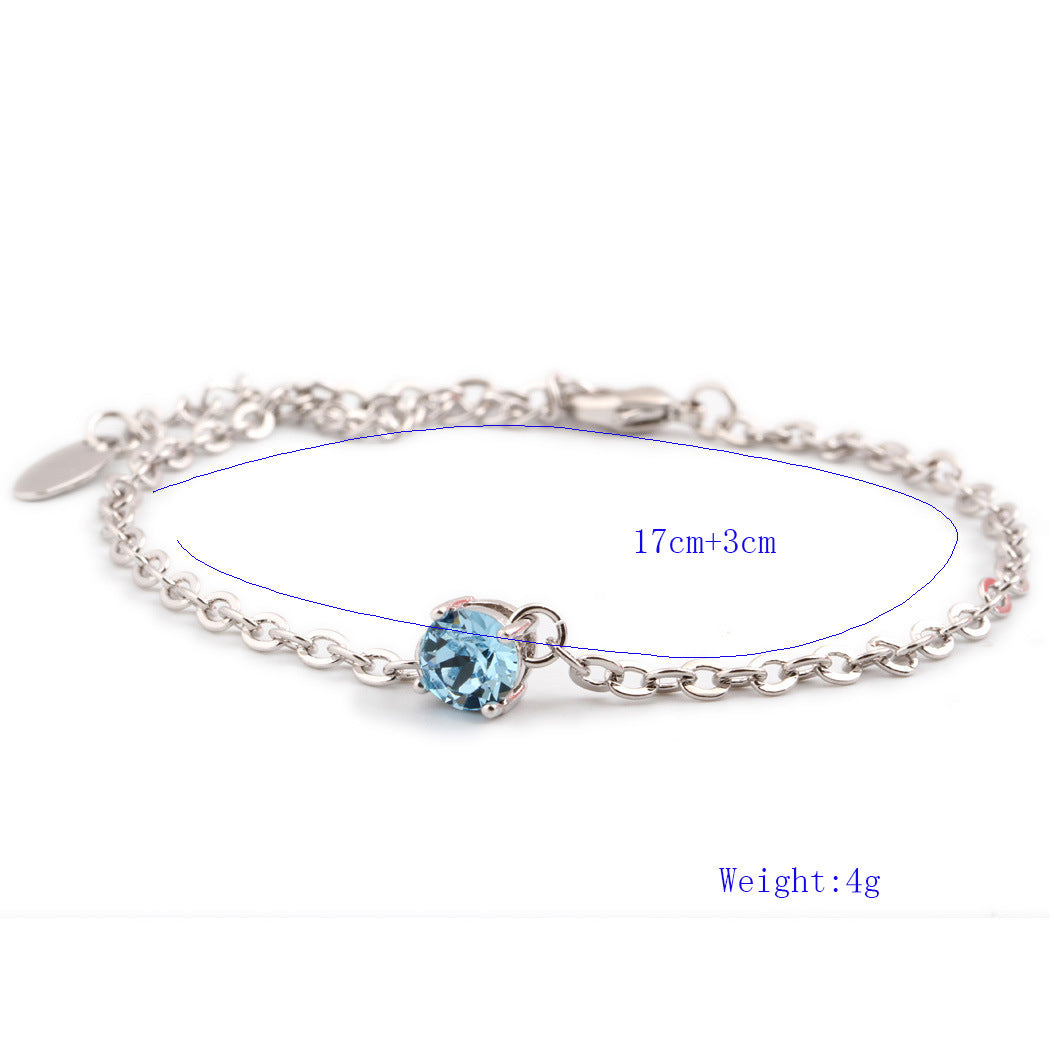Bracelet en cristaux autrichiens plaqué platine pour femmes, bijoux élégant avec cristaux brillants et finition raffinée.