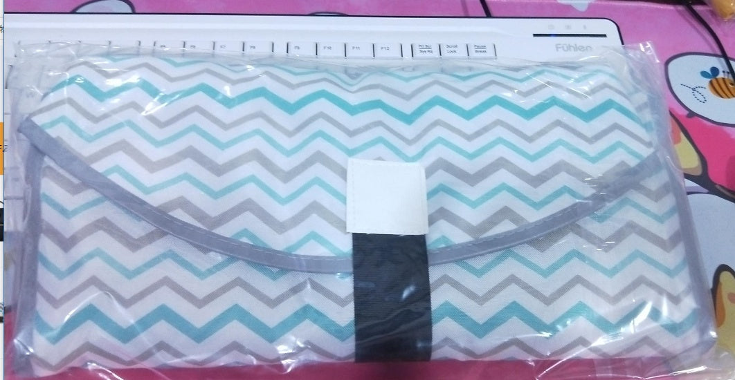 Tapis à langer portable pour bébé MARKET DE PRODUITS DE BEAUTÉ & SANTÉ, pratique pour changer les couches des nouveau-nés.